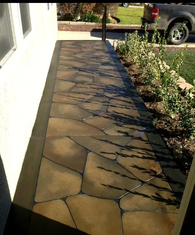 Flagstone walkway along a planted side yard